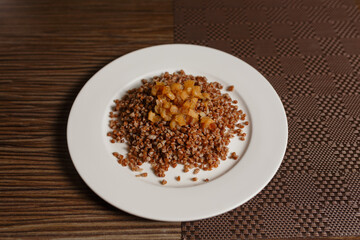 buckwheat with bacon on a plate