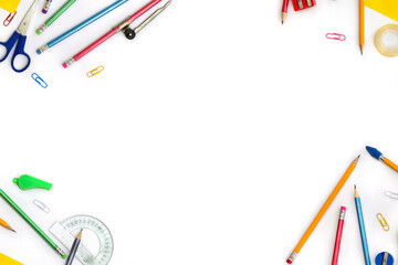 Back to School. Frame of school supplies ( pencil, scissors, sharpener, clips, crayons ) on a white...