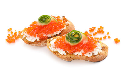Tasty bruschettas with cheese, red caviar and cucumber on white background