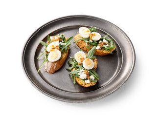Tasty bruschettas with cheese, eggs and arugula on white background