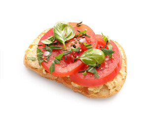 Tasty bruschetta with tomato and hummus on white background
