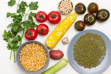 Chickpea, corn and mung bean grains in plates.
