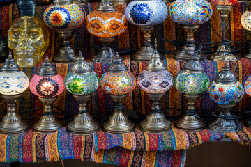 glass night lamps lined up side by side