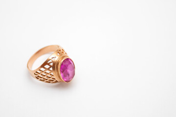 Gold ring with ruby isolated on white background