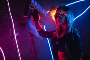 Cyberpunk girl in the neon lights.