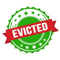 EVICTED text on red green ribbon stamp.
