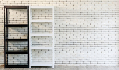 Black and white blank empty metal shelf in mininal style in front of vintage brick wall with copy space