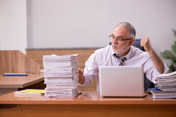 Old male employee and too much work in the office