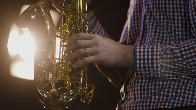 Man playing the saxophone, close-up