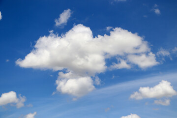 Naklejka na ściany i meble The blue sky with clouds has a strange pattern.