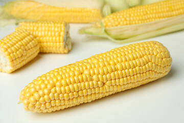 Fresh raw corn on white background, close up