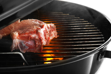 Barbecue grill with tasty meat on white background, closeup