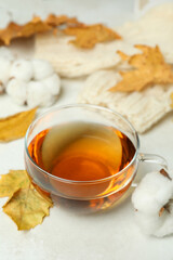 Cozy autumn concept background with tea drink