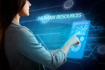 Business, Technology, Internet and network concept. Young businessman working on a virtual screen of the future and sees the inscription: Human resources