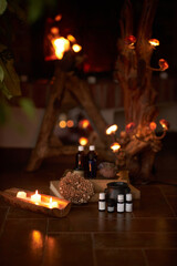 Naturally developed massage therapy and body care products in a rustic wooden environment; essential oils, body butter, candles and aromatic ingredients
