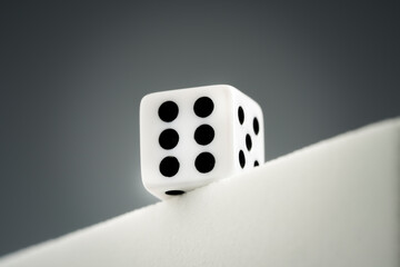 white dice on black background