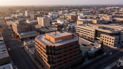 Sunset aerial view of historic downtown Bakersfield, California, USA. - obrazy, fototapety, plakaty