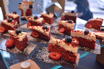Merry Christmas happy season party buffet night with pastry log cake sweet desserts, bbq roast turkey, honey ham, bulgogi beef, pie, canapés, butler, drinks and fruits in 5 star hotel 