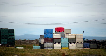 Stacked plastic boxes with tuna and ice in Westhaven port
