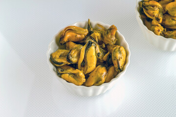 Open mussel shells on the plate