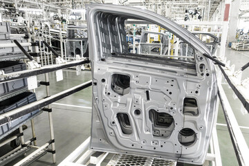 doors for automobile production Stamping parts for automotive manufacturing, silver color.