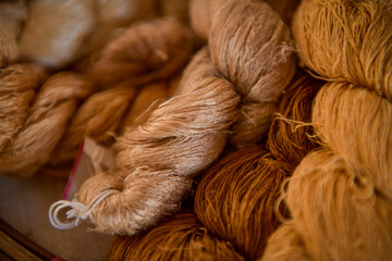 Crafts and craftsmanship. Traditional Isan Thai silk indigo weaving.Craftsmen of Thai Silk.