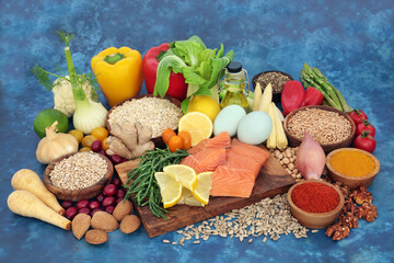 Healthy food to boost the immune system concept with a large collection of health foods. High in...