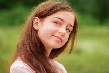 Beautiful young girl. Portrait of a teenager girl outdoors