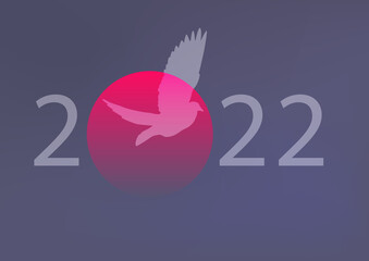 Concept de carte de vœux pour 2022, sur le thème de la paix et de la liberté avec une colombe qui s’envole devant un coucher de soleil.