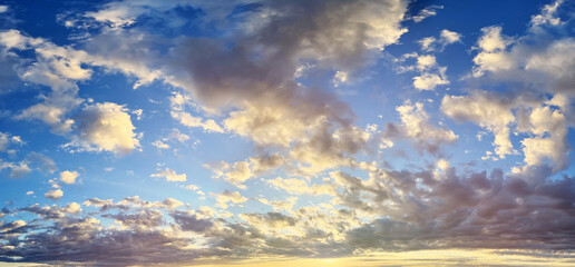Blue sky, white clouds and sunlight. Sunrise background