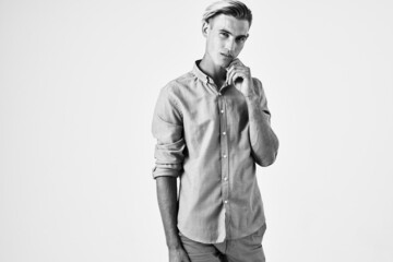 man fashionable hairstyle and in a shirt tie posing black and white photo