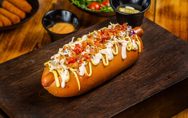 Hotdog with meat and sauce