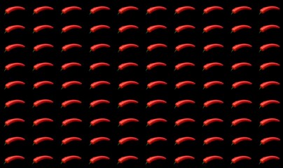 Background for banners and designs. Red pepper on a black background. The pattern. Wallpapers and textures