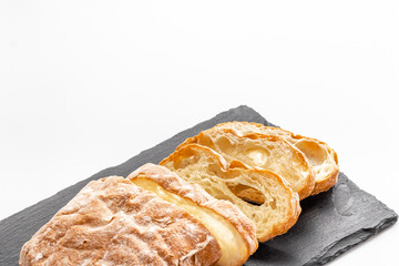 Fresh bread ciabatta loaf close up. Bakery background