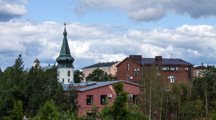 view of the old city with ancient architecture and a cloudy sky on a summer day. Concept-travel and tourism in Vyborg Leningrad region