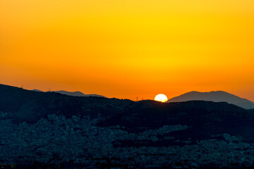 Beautiful sunset colors over the mountains Athens, Greece