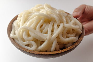 Udon noodles on a white background