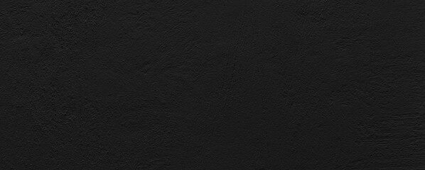 Panorama of The cement wall is painted black with a pattern texture and background seamless
