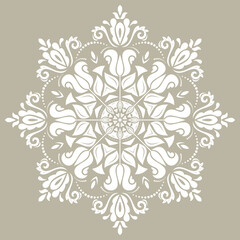 Elegant vintage ornament in classic style. Abstract traditional pattern with oriental elements. Classic round white vintage pattern