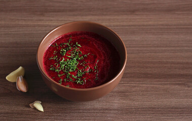 summer cold beet soup with greens and cucumbers