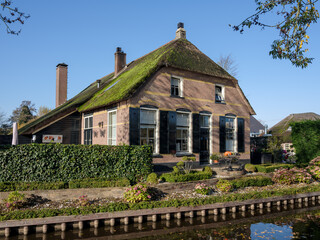 Centuries-old thatched-roof houses in Giethoorn, Steenwijkerland,  Overijssel Province, The Netherlands