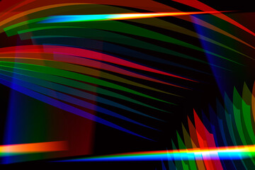 Abstract black background with rainbow highlights of light