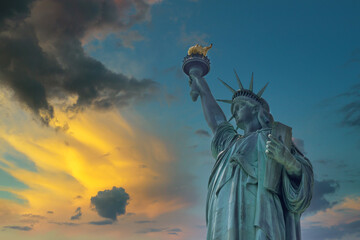 Aerial view of the Statue of Liberty at sunset in Manhattan New York City, United States