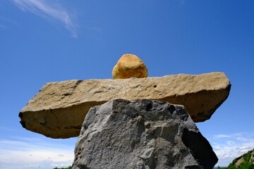 balancing stone totem on volcanic hill
