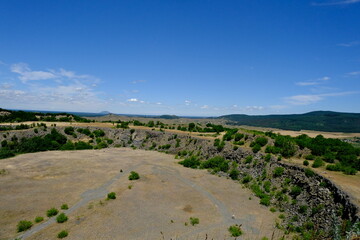 volcanic crater with basaltic rock formations