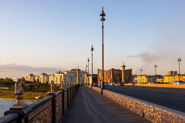 Fototapeta na wymiar View from ”Maral” bridge at Amman Street in Nur-Sultan, Kazakhstan. Sunset time.