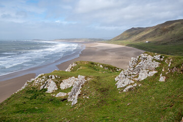 Rhossili Bay in the Gower Peninsula on a summer's day in Swansea, Wales