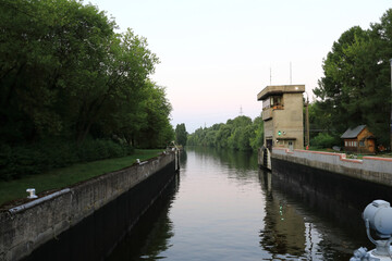 Fototapeta na wymiar View of lock on Oka river at sunset