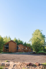 Barnhouse style houses. A street with cozy small houses. Modern construction