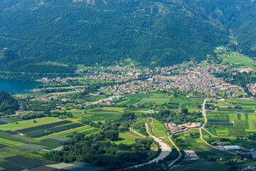 Aerial view of the small Levico Terme with the small lake (Lago di Levico), famous tourist resort in Valsugana or Sugana valley, Trento province, Trentino Alto Adige, Italy, Europe.